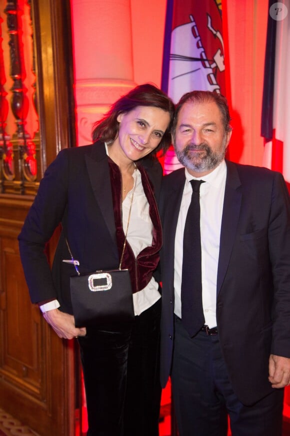 Le mannequin Inès de La Fressange et son compagnon Denis Olivennes - Dîner de la FIDH (Fédération International des Droits de l'Homme) à l'Hôtel de Ville de Paris le 8 décembre 2015.