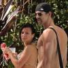 Michael Phelps kicks back and catches a few sun rays at his hotel pool today with a new brunette lady in Miami, FL, USA on January 20, 2012. The Olympic swimmer recently just broke up with long time Miss California girlfriend Nicole Johnson who looks very much like Michael's new lady friend. Photo by GSI/ABACAPRESS.COM21/01/2012 - Miami