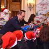 Le prince Albert II de Monaco et la princesse Charlene, secondés par Louis Ducruet et Camille Gottlieb, ont distribué le 16 décembre 2015 les cadeaux de Noël aux enfants monégasques, au palais princier. © Bruno Bébert / Bestimage
