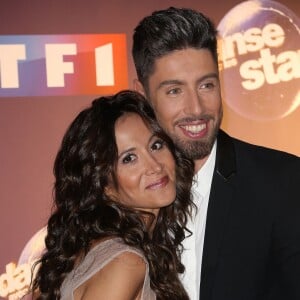 Fabienne Carat et Julien Brugel - Photocall "Danse avec les stars 6" devant TF1 à Boulogne-Billancourt, le 7 octobre 2015.