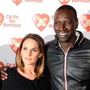 Omar Sy et sa femme Hélène - Avant-Première du film "Samba" au Gaumont Champs-Elysées Marignan à Paris pour l'association "Cé Ke du Bonheur" à Paris le 14 octobre 2014.