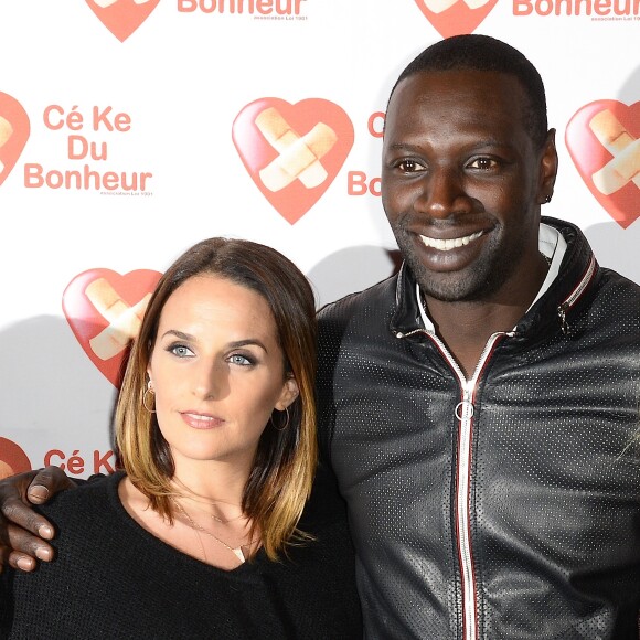 Omar Sy et sa femme Hélène - Avant-Première du film "Samba" au Gaumont Champs-Elysées Marignan à Paris pour l'association "Cé Ke du Bonheur" à Paris le 14 octobre 2014.