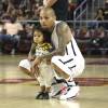 Chris Brown et sa fille Royalty à l'USC Galen Center. Los Angeles, le 20 septembre 2015.