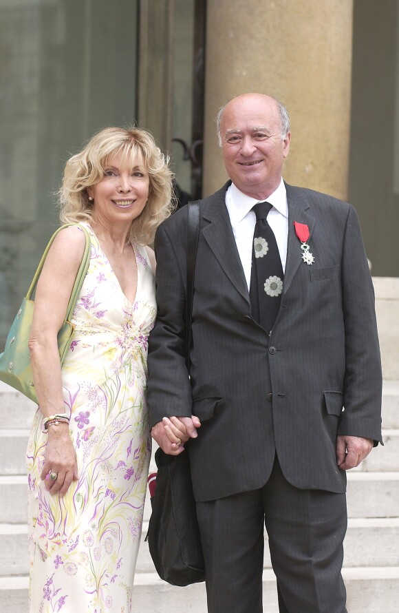 Georges Wolinski et Maryse à la sortie du Palaise de l'Elysée à Paris, le 27 juin 2005