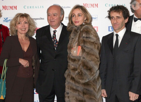 Maryse Wolinski et Georges Wolinski avec Emmanuelle Béart et Alain Prost au Ritz de Paris, le 26 janvier 2005