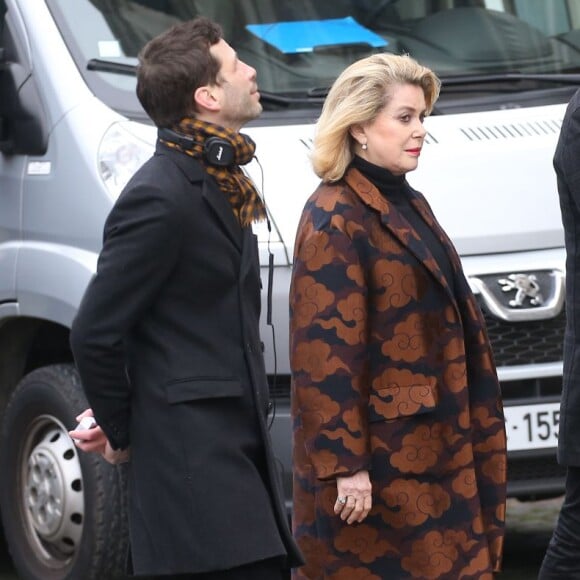 Alex Beaupain et Catherine Deneuve - Obsèques de Michel Delpech en l'église Saint-Sulpice à Paris, le 8 janvier 2016.