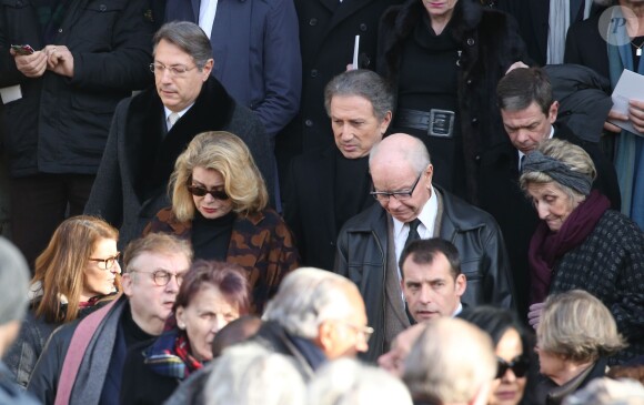 Catherine Deneuve, Michel Drucker, Dominique Besnehard - Sorties des obsèques de Michel Delpech en l'église Saint-Sulpice à Paris, le 8 janvier 2016.