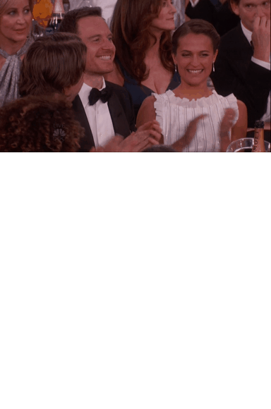 Michael Fassbender et Alicia Vikander pendant les Golden Globes 2016.