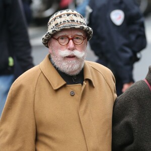 Jean-Paul Rouland et sa femme - Obsèques de Michel Galabru en l'église Saint-Roch à Paris le 12 janvier 2016.