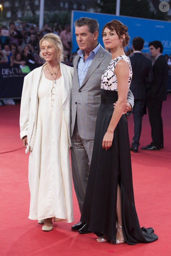 Beau St. Clair, Pierce Brosnan et Olga Kurylenko (habillée en Dior) - Avant-première du film "The November Man" lors du 40e festival du film américain de Deauville, le 11 septembre 2014.