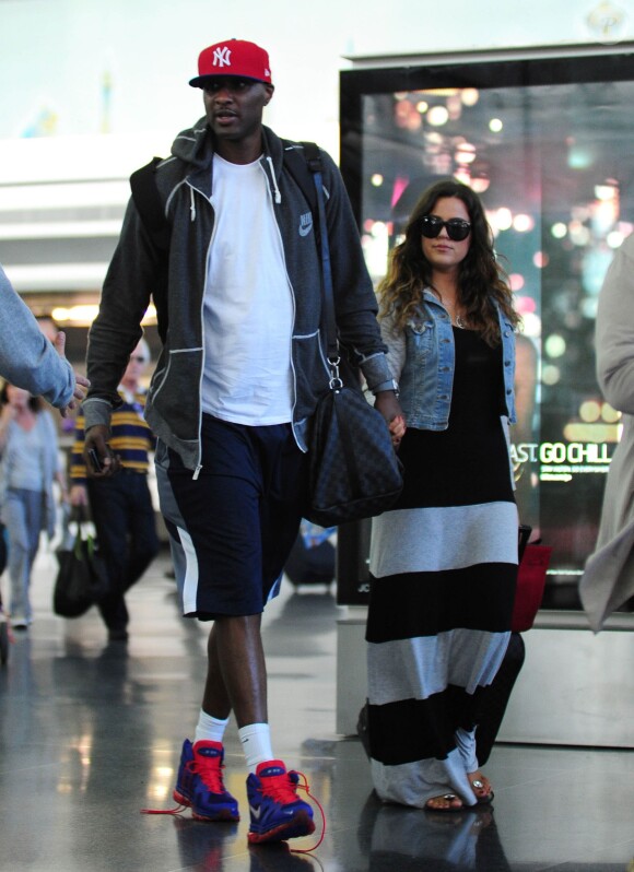 Lamar Odom et Khloe Kardashian arrivent à l'aéroport JFK en juin 2012
