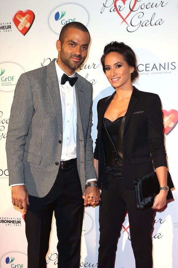 Tony Parker et sa femme Axelle Francine - Personnalités au gala "Par Coeur" pour les 10 ans de l'association "Cekedubonheur" au pavillon d'Armenonville à Paris. Le 24 septembre 2015.