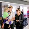 Alanis Morissette et son mari Mario Treadway avec leur fils Ever, à Los Angeles, le 2 octobre 2014.