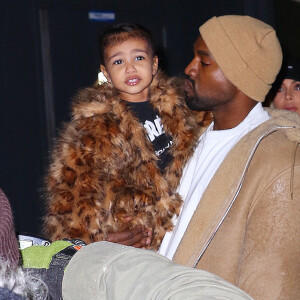 Kim Kardashian, son mari Kanye West et leur fille North à New York, le 14 février 2016.