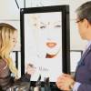 De passage au Japon, Madonna assure la promotion de sa ligne de cosmétiques MDNA Skin dans un grand magasin de Tokyo, le 15 février 2016.