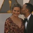 Chrissy Teigen enceinte et John Legend aux Oscars 2016.