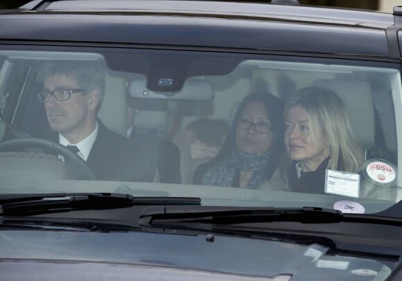 Lady Helen Windsor Taylor et son mari Timothy Taylor arrivant en décembre 2013 à Buckingham Palace pour le déjeuner de Noël offert par la reine Elizabeth II.