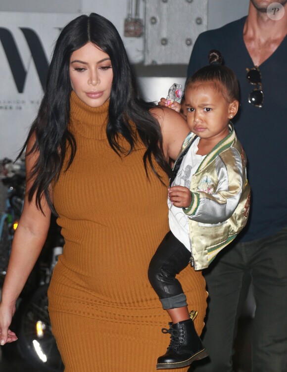 Kim Kardashian et sa fille North West se promènent dans les rues de New York, le 08/09/2015 - New York