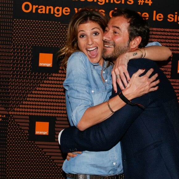 Caroline Ithurbide, Bernard Montiel - Photocall de la 4e édition de l'exposition des projets réalisés par les participants du concours "Orange Jeunes Designers" au Carreau du Temple à Paris, le 4 juin 2015.