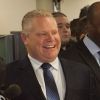 Rob Ford se déclare candidat à la mairie de Toronto, le 2 janvier 2014, aux côtés de son frère Doug.