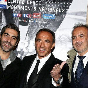 Ary Abittan, Nikos Aliagas, guest - Inauguration de l'exposition photographique de Nikos Aliagas intitulée "Corps et âmes" à la Conciergerie à Paris le 23 Mars 2016. L'animateur de TF1 présente, dans ce monument historique et révolutionnaire, une facette moins connue de sa personnalité : il expose, en grand format et en noir et blanc, dix clichés très personnels ainsi qu'un diaporama de portraits de personnalités du 24 mars au 22 mai 2016. © Dominique Jacovides / Bestimage