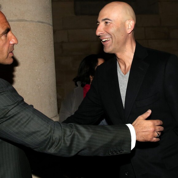 Nikos Aliagas, Nicolas Canteloup - Inauguration de l'exposition photographique de Nikos Aliagas intitulée "Corps et âmes" à la Conciergerie à Paris le 23 Mars 2016. L'animateur de TF1 présente, dans ce monument historique et révolutionnaire, une facette moins connue de sa personnalité : il expose, en grand format et en noir et blanc, dix clichés très personnels ainsi qu'un diaporama de portraits de personnalités du 24 mars au 22 mai 2016. © Dominique Jacovides / Bestimage