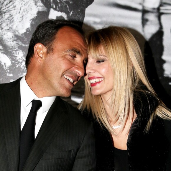 Nikos Aliagas et sa compagne Tina Grigoriou - Inauguration de l'exposition photographique de Nikos Aliagas intitulée "Corps et âmes" à la Conciergerie à Paris le 23 Mars 2016. L'animateur de TF1 présente, dans ce monument historique et révolutionnaire, une facette moins connue de sa personnalité : il expose, en grand format et en noir et blanc, dix clichés très personnels ainsi qu'un diaporama de portraits de personnalités du 24 mars au 22 mai 2016. © Dominique Jacovides / Bestimage