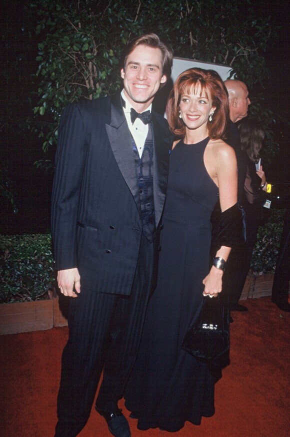 Jim Carrey et Lauren Holly en 1995 lors des Golden Globes