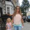 Katie Price et sa fille Princess Tiaamii quittent une clinique sur Harley Street à Londres, le 15 juillet 2014.