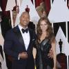Dwayne "The Rock" Johnson et sa compagne Lauren Hashian à la 87ème cérémonie des Oscars à Hollywood, le 22 février 2015.