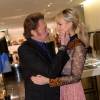 Exclusif - Johnny Hallyday et sa femme Laeticia Hallyday - Le joaillier Aaron Jah Stone et l'artiste Kongo ont présenté une nouvelle collection qui allie street art et joaillerie chez Montaigne Market à Paris le 4 mars 2016.