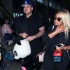 Rob Kardashian et sa compagne Blac Chyna arrivent à l'aéroport LAX de Los Angeles, Rob a ramené une énorme peluche, Los Angeles le 27 Mars 2016