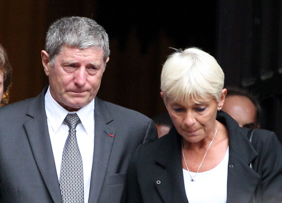 Jean-Michel Larqué et sa femme - Obsèques de Thierry Roland en 2012.