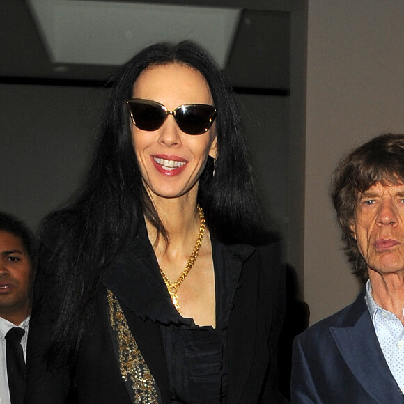 L'Wren Scott et Mick Jagger au Defile "L'Wren Scott" pendant la Fashion Week a Londres, le 15 septembre 2013.
