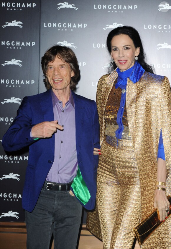 Mick Jagger et L'Wren Scott à l'Inauguration du nouveau flagship Longchamp a Londres, le 14 septembre 2013.