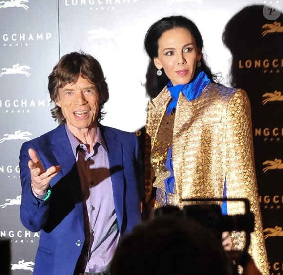 Mick Jagger, L'Wren Scott à la soiree du magazine W a Londres, le 14 septembre 2013.