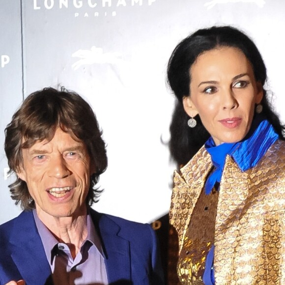 Mick Jagger, L'Wren Scott à la soiree du magazine W a Londres, le 14 septembre 2013.