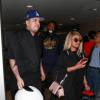 Rob Kardashian et sa compagne Blac Chyna arrivent à l'aéroport LAX de Los Angeles le 27 Mars 2016