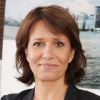 Carole Rousseau - Courtier d'un jour pour encourager les clients à passer ce jour là le maximum d'ordres dans la salle des marchés d'Aurel BGC Rue Vivienne à Paris. Le 11 septembre 2014.