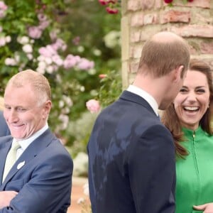 Le prince William, la duchesse Catherine de Cambridge et le prince Harry en visite au Chelsea Flower Show 2016 à Londres, le 23 mai 2016.