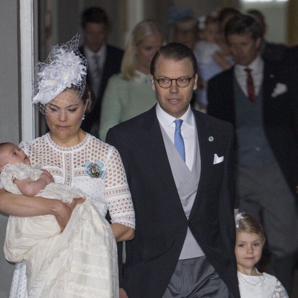 La princesse Victoria de Suède et son fils le prince Oscar, le prince Daniel de Suède et sa fille la princesse Estelle - Baptême du prince Oscar de Suède à Stockholm en Suède le 27 mai 2016.