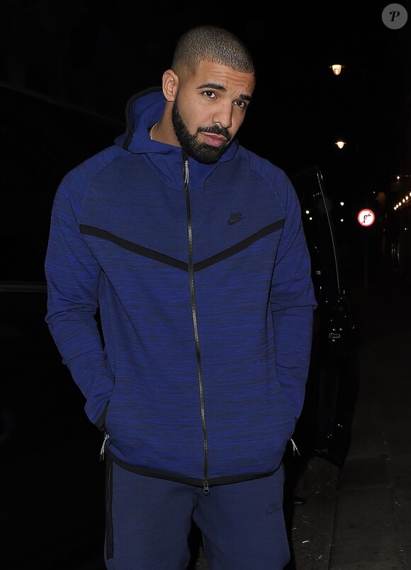 Drake quitte le club Tramp Mayfair à Londres le 26 février 2016.