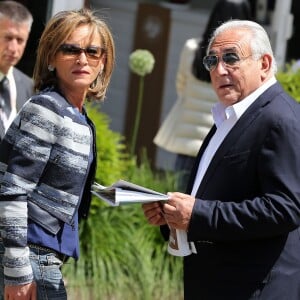 Dominique Strauss Kahn et sa compagne Myriam L'Aouffir aux Internationaux de France de tennis de Roland Garros le 30 mai 2015.