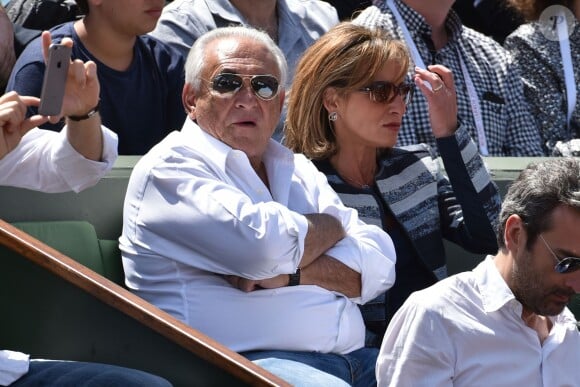 Dominique Strauss Kahn et sa compagne Myriam L'Aouffir - People dans les tribunes des Internationaux de France de tennis de Roland Garros le 30 mai 2015.