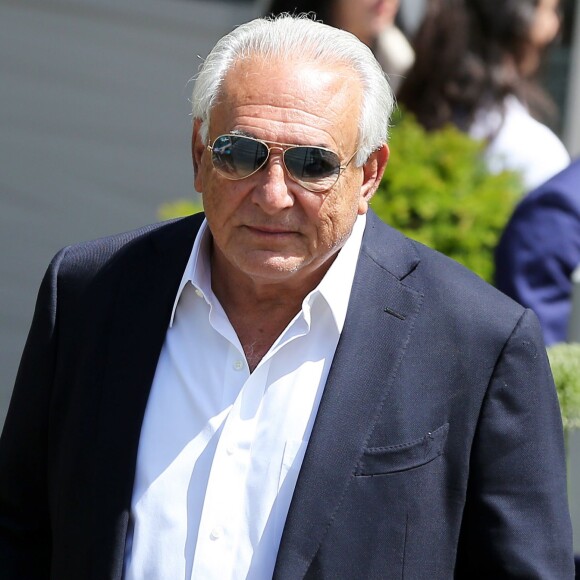 Dominique Strauss Kahn et sa compagne Myriam L'Aouffir aux Internationaux de France de tennis de Roland Garros le 30 mai 2015.