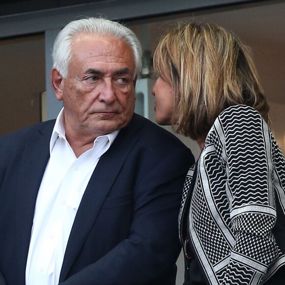 Dominique Strauss Kahn et sa compagne Myriam L'Aouffir assistent à la finale de la Coupe de France entre le Psg et Auxerre au Stade de France à Saint-Denis le 30 mai 2015.