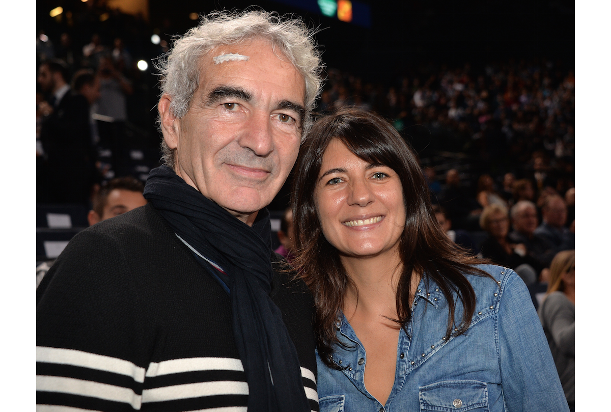Photo Raymond Domenech et sa compagne Estelle Denis, lors de la