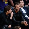 David et Brooklyn Beckham au Staples Center à Los Angeles, le 15 avril 2016.