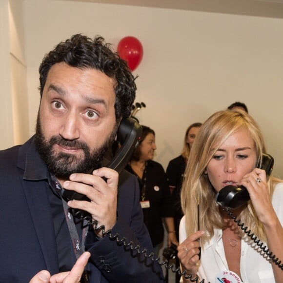 Cyril Hanouna et Enora Malagré - 11e édition du "BGC Charity Day" à Paris le 11 septembre 2015 en mémoire aux 658 collaborateurs du groupe BGC partners (leader mondial du courtage interbancaire) disparus il y a 14 ans dans les attentats du World Trade Center le 11 septembre 2001.