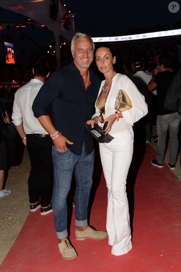 Exclusif - David Ginola et sa femme Coraline à la 3ème édition de la "Fight Night" à Saint-Tropez. Les plus grands noms de la Boxe Thaï et du Kick-Boxing mondiaux se sont affrontés sur le ring, au milieu de La Citadelle. Le 4 août 2015